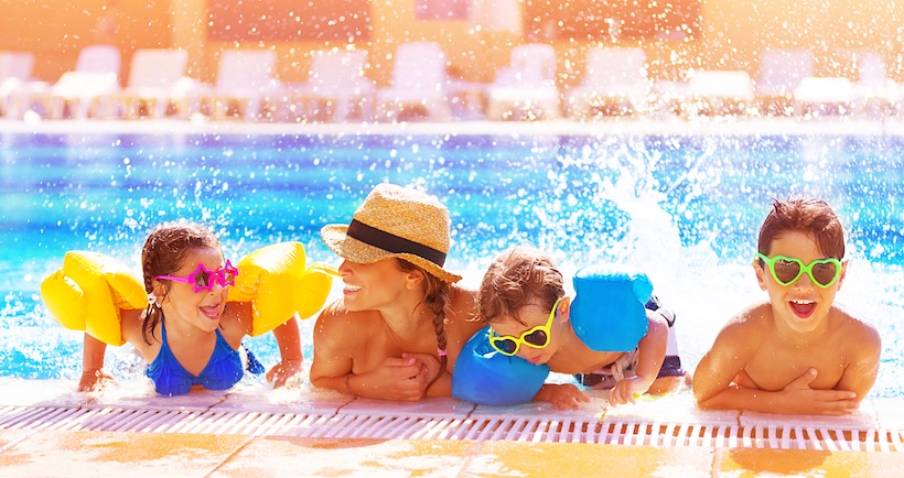 family in newly built pool in Las Vegas